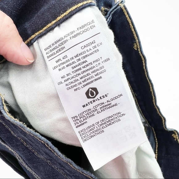 Levi's Denizen High Rise Shortie Distressed Jean Shorts - Picture 4 of 6